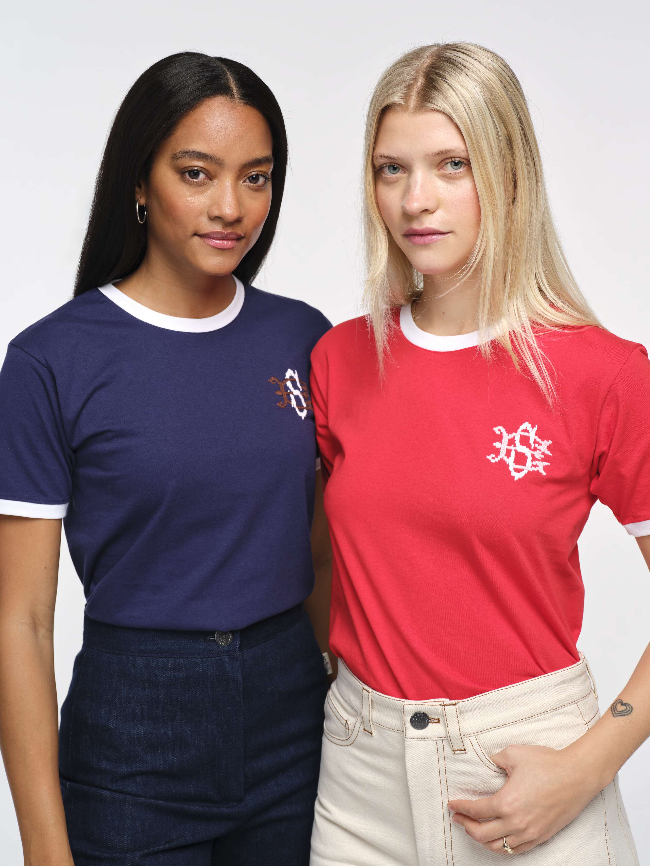 Closeup Front Shot of Models Wearing Round Sleeve Pixel Shirt Navy with Brown ES Embroidery and Red with White ES Embroidery 