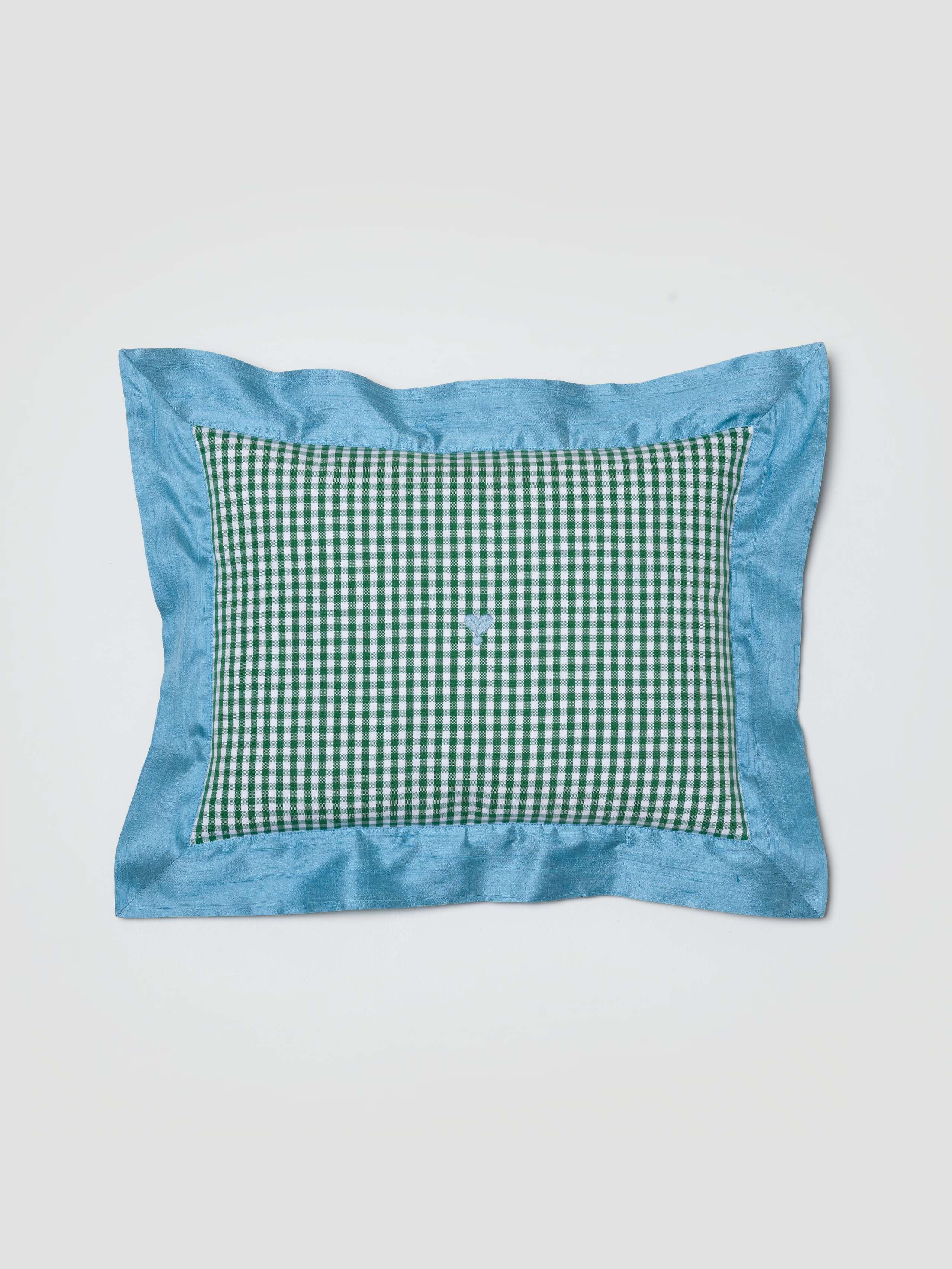 Milo pillow cover in Linden Green vichy with electric blue doupion frame