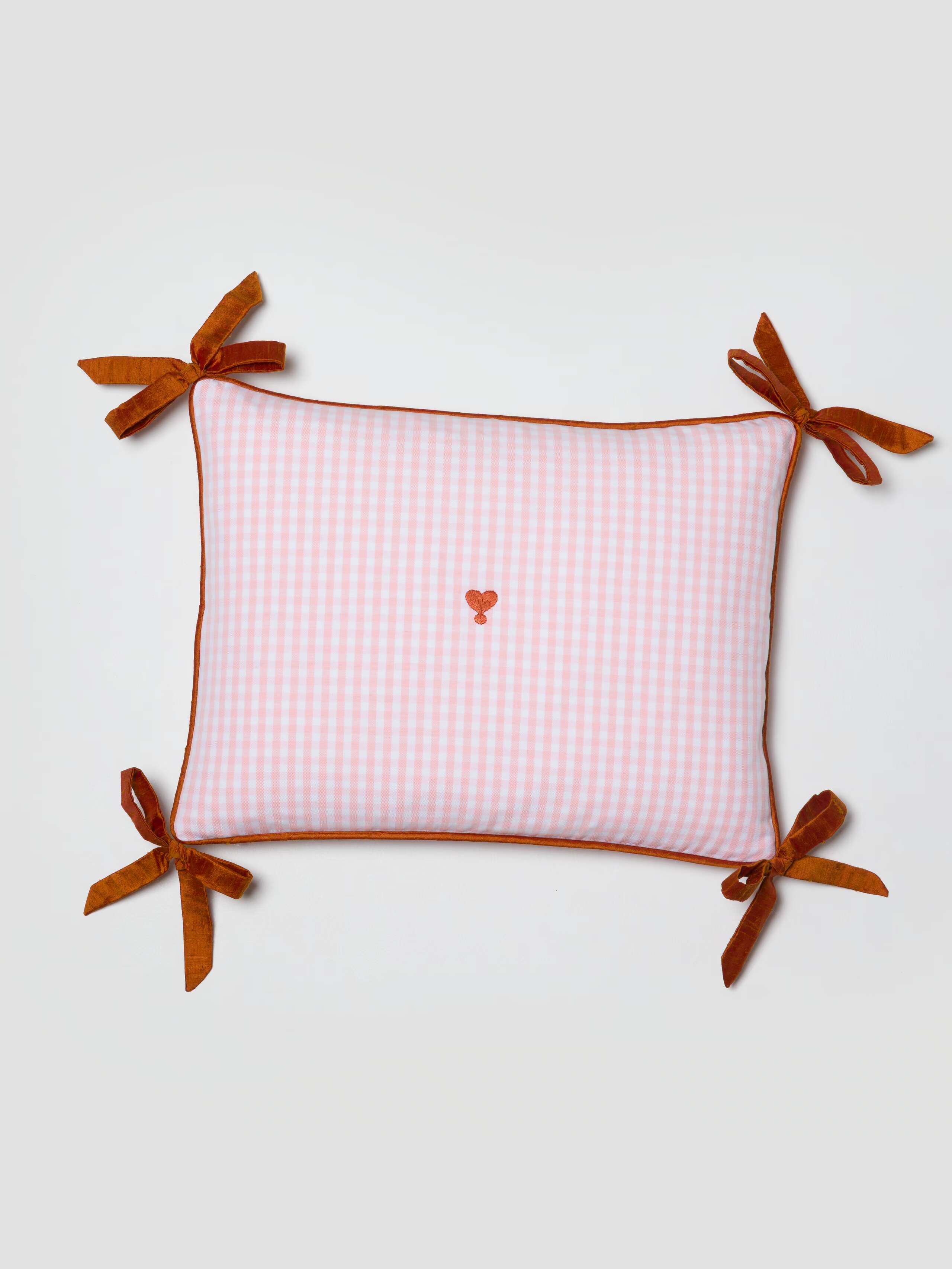 Milo pillow cover in Candy Pink with orange doupion ribbon