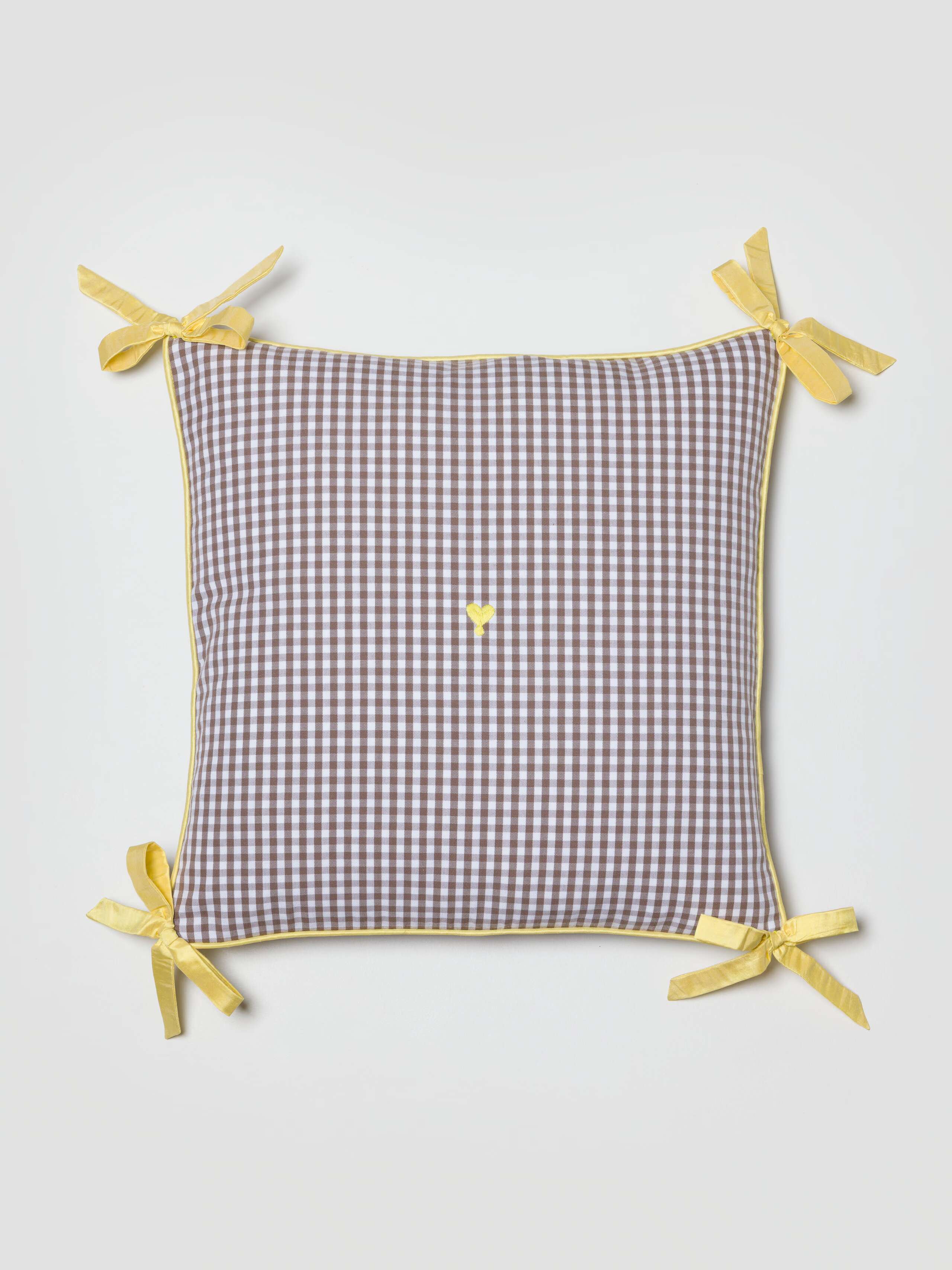 Mila pillow cover in Moonrock with yellow doupion ribbon