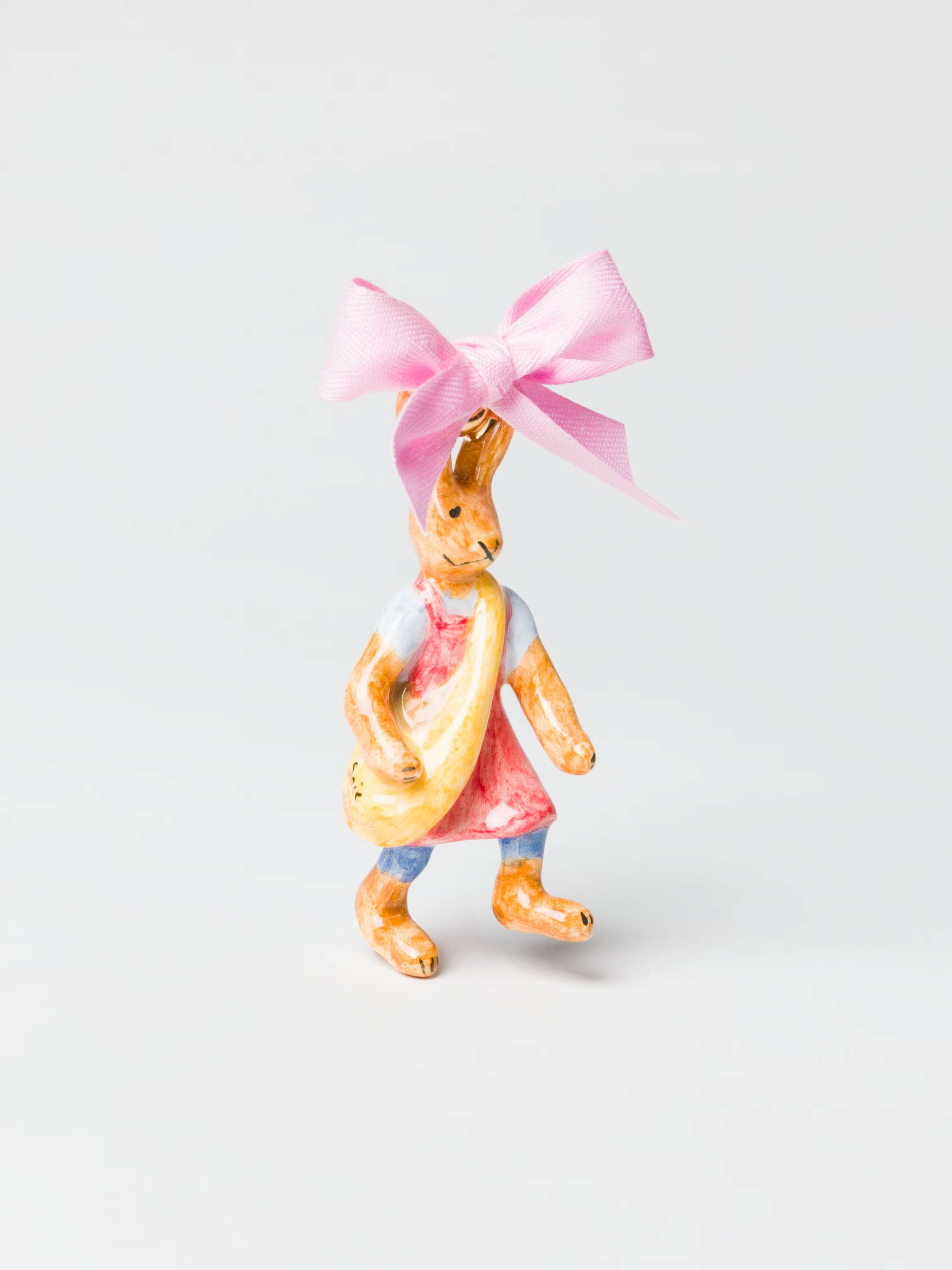 Product Shot of Rabbit with Garden Bag Ornament and Pink Cotton Bow 