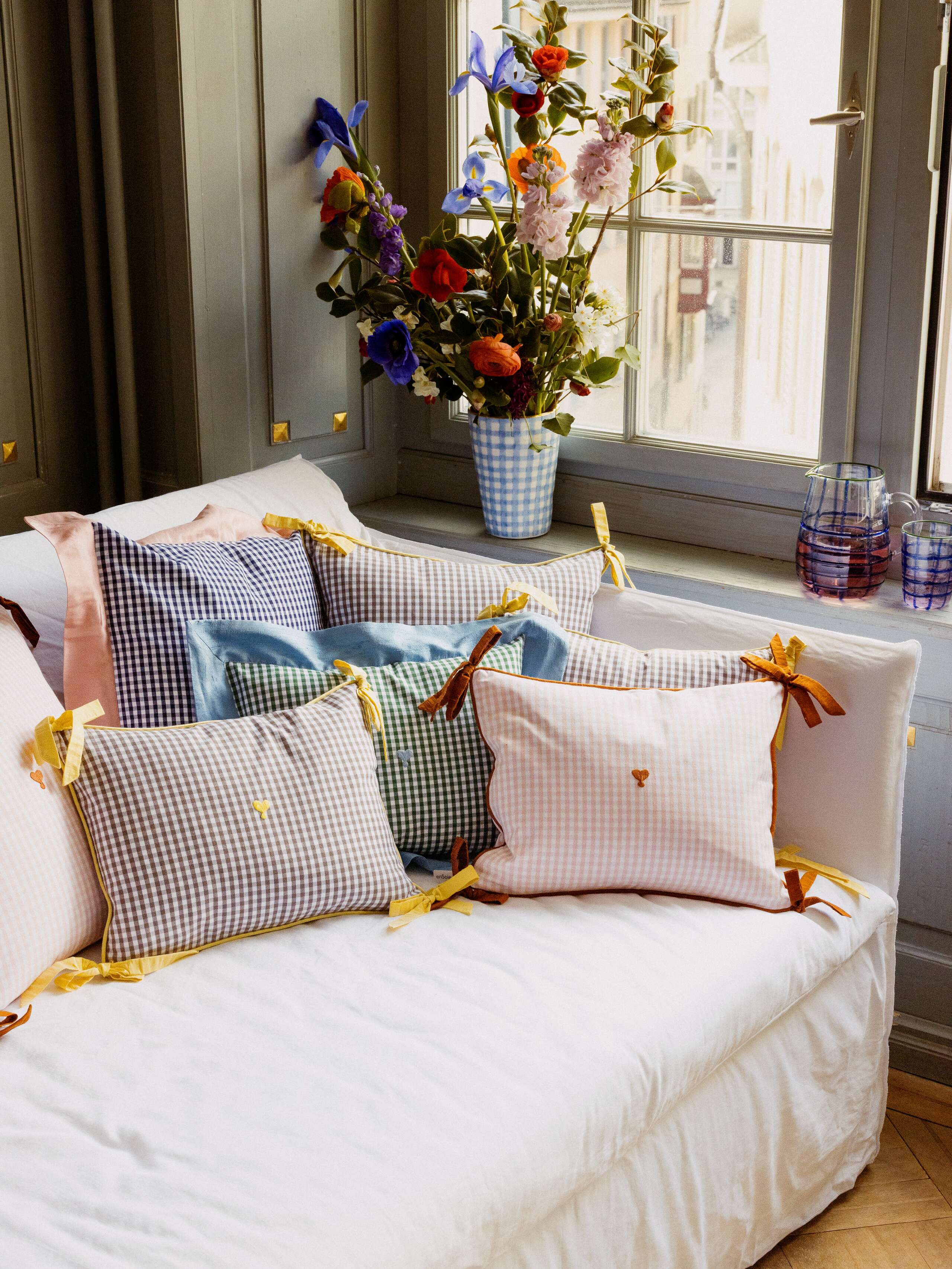 Picture od a sofa covered with beautiful pillows