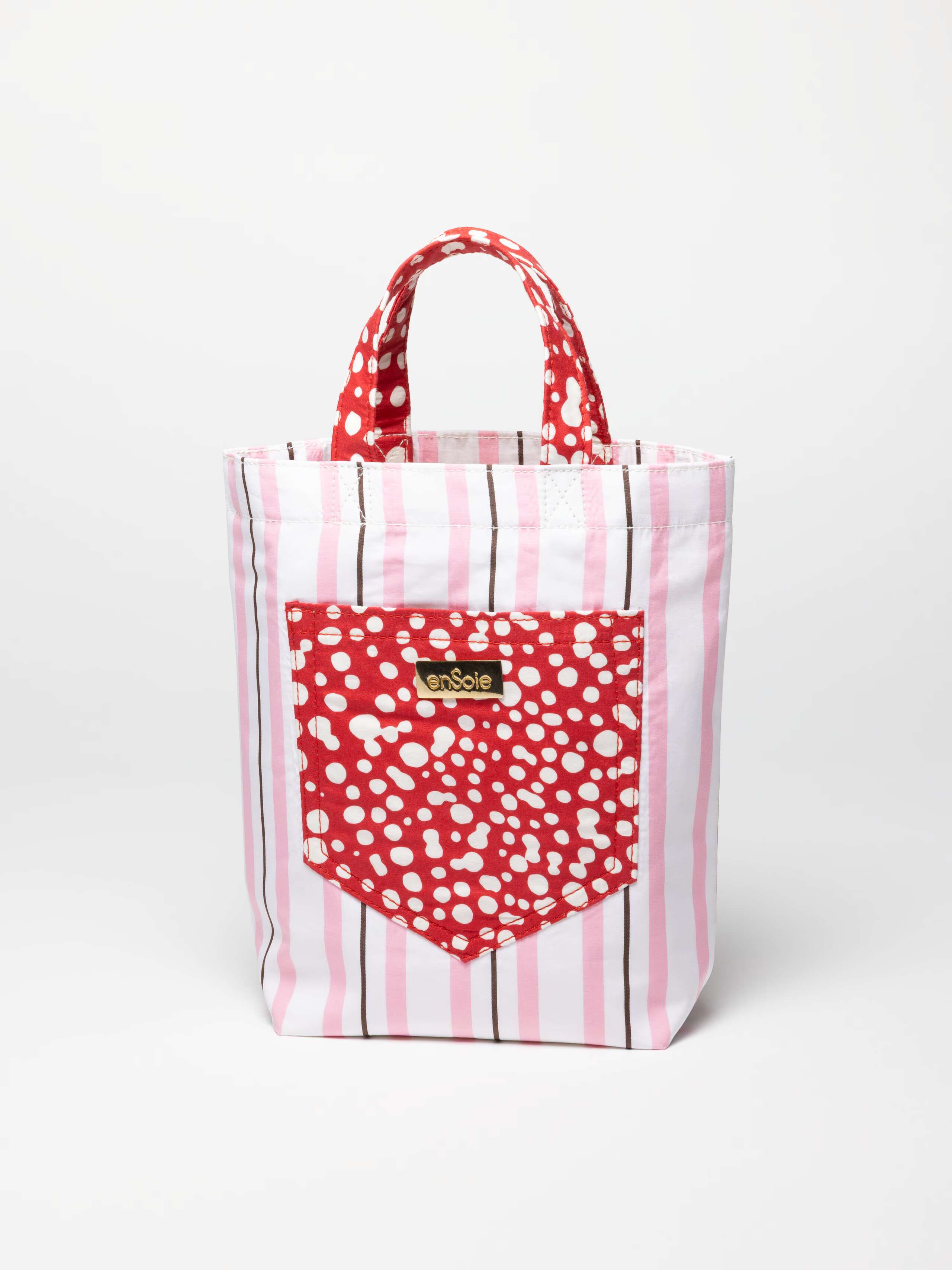 Product shot of June Bag in Rose Stripe with Red Dot accents 
