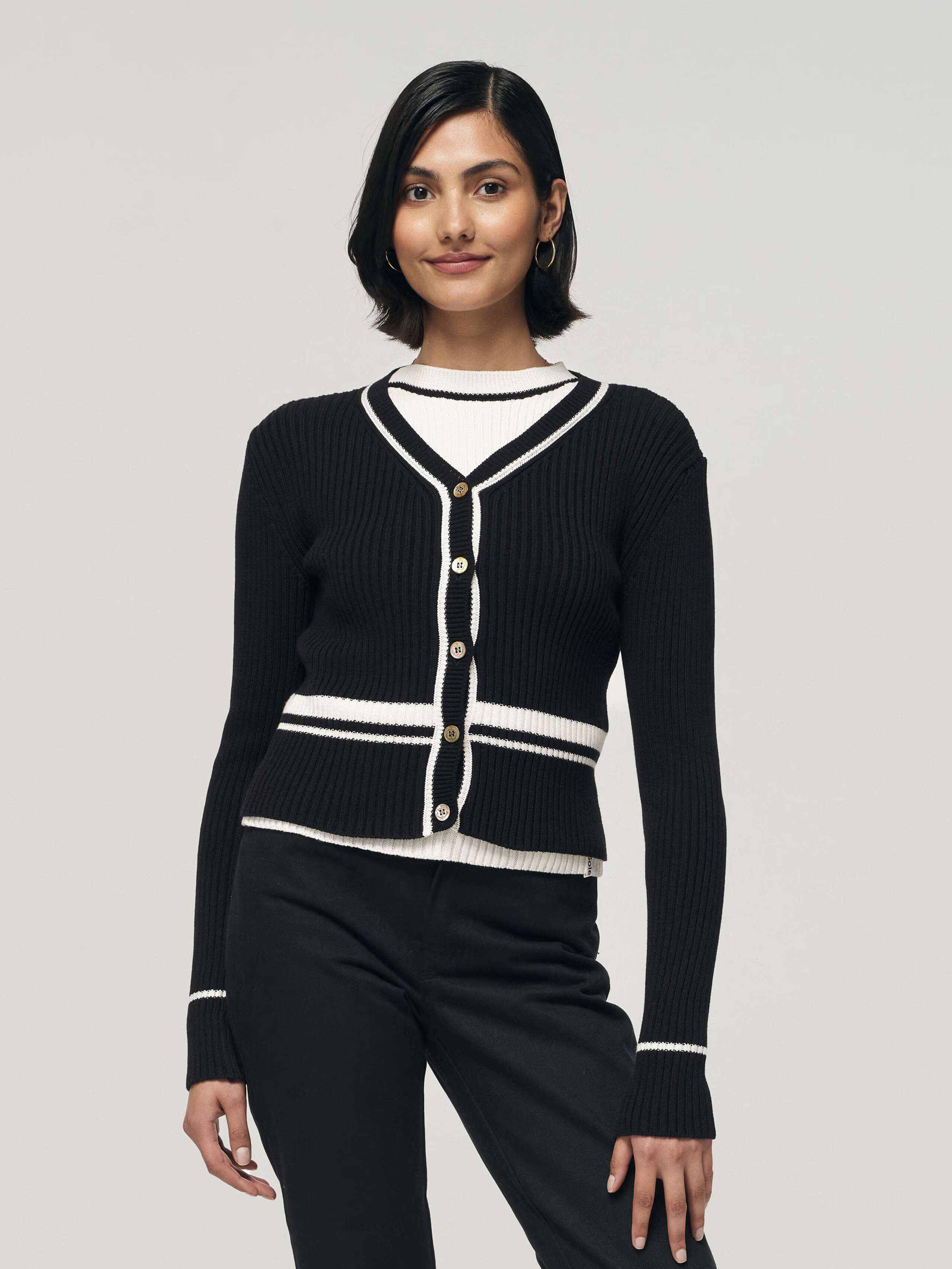 Mel Cardigan in black with white details