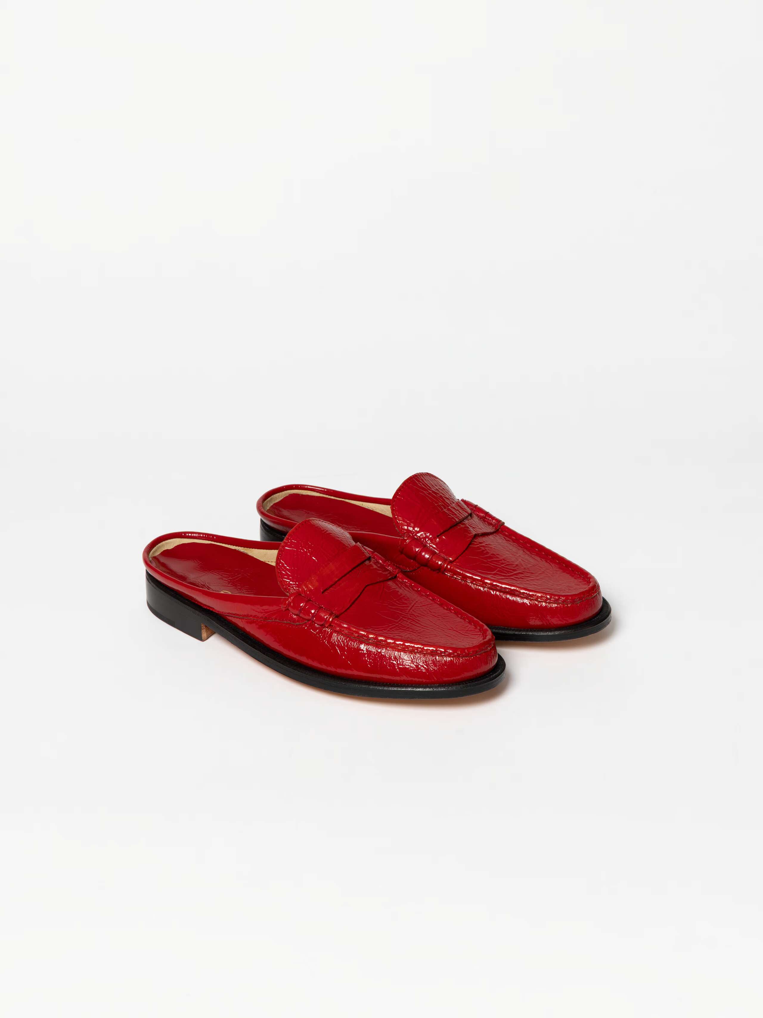 Product Shot of Guido Patent Mules in Red 