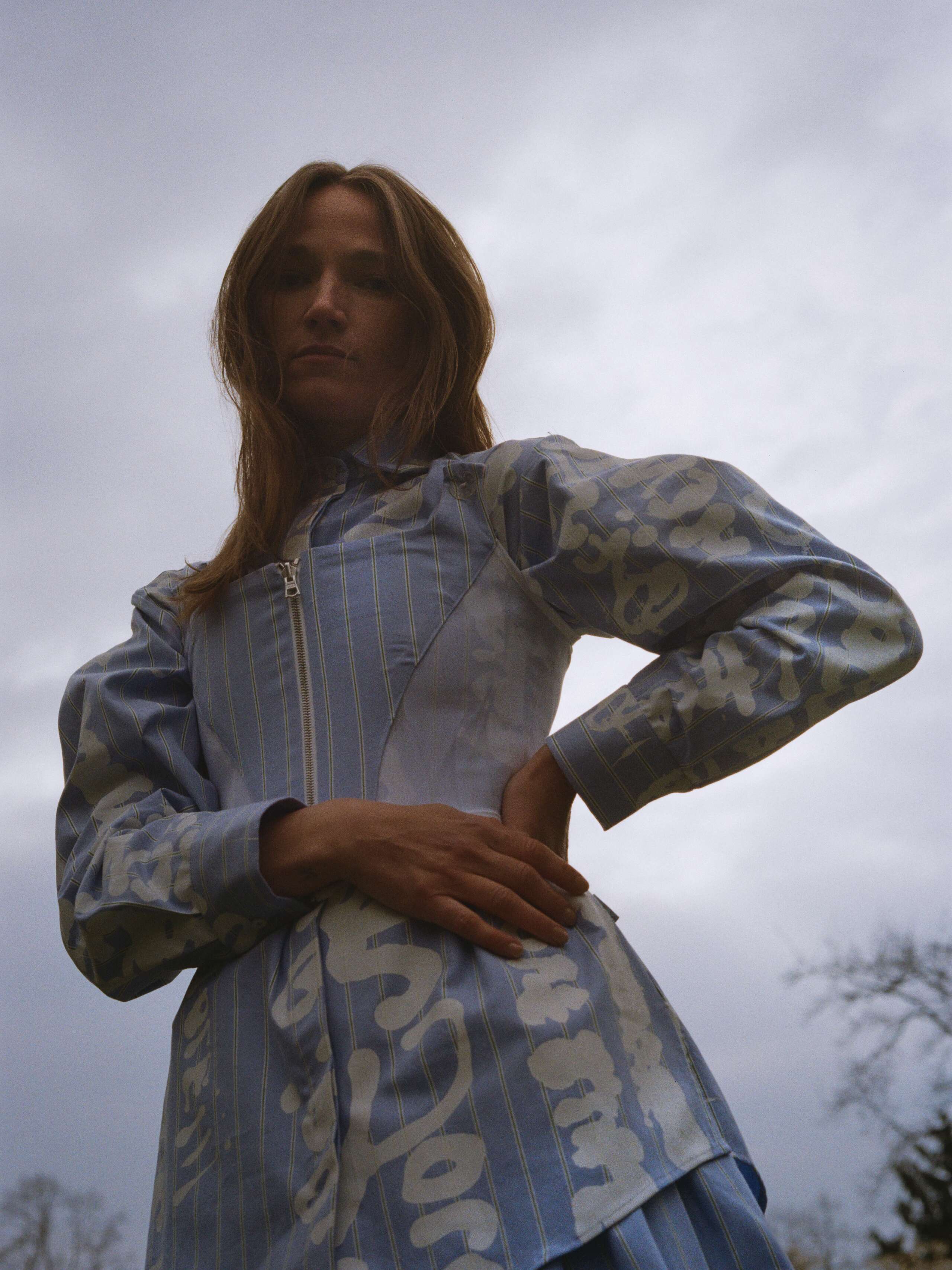 Picture of a young women wearing a light blue shirt