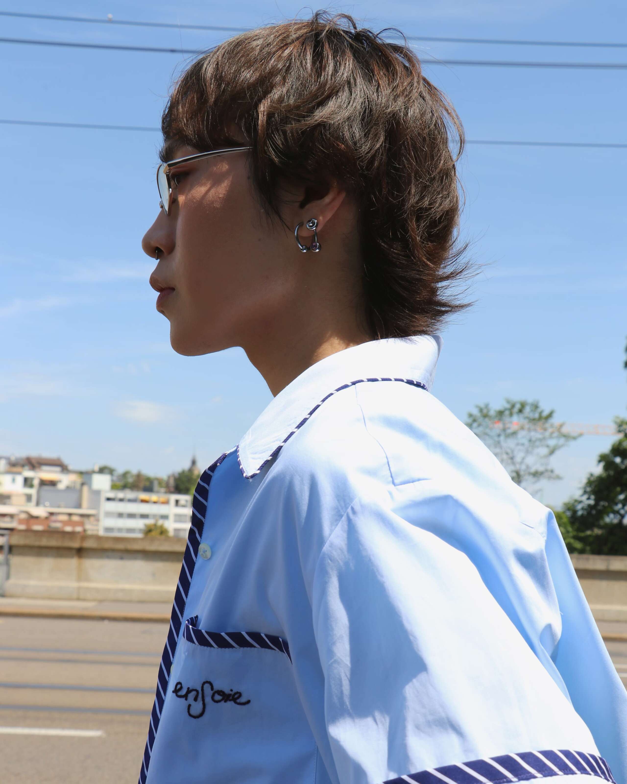Picture of a young man wearing an enSoie shirt.