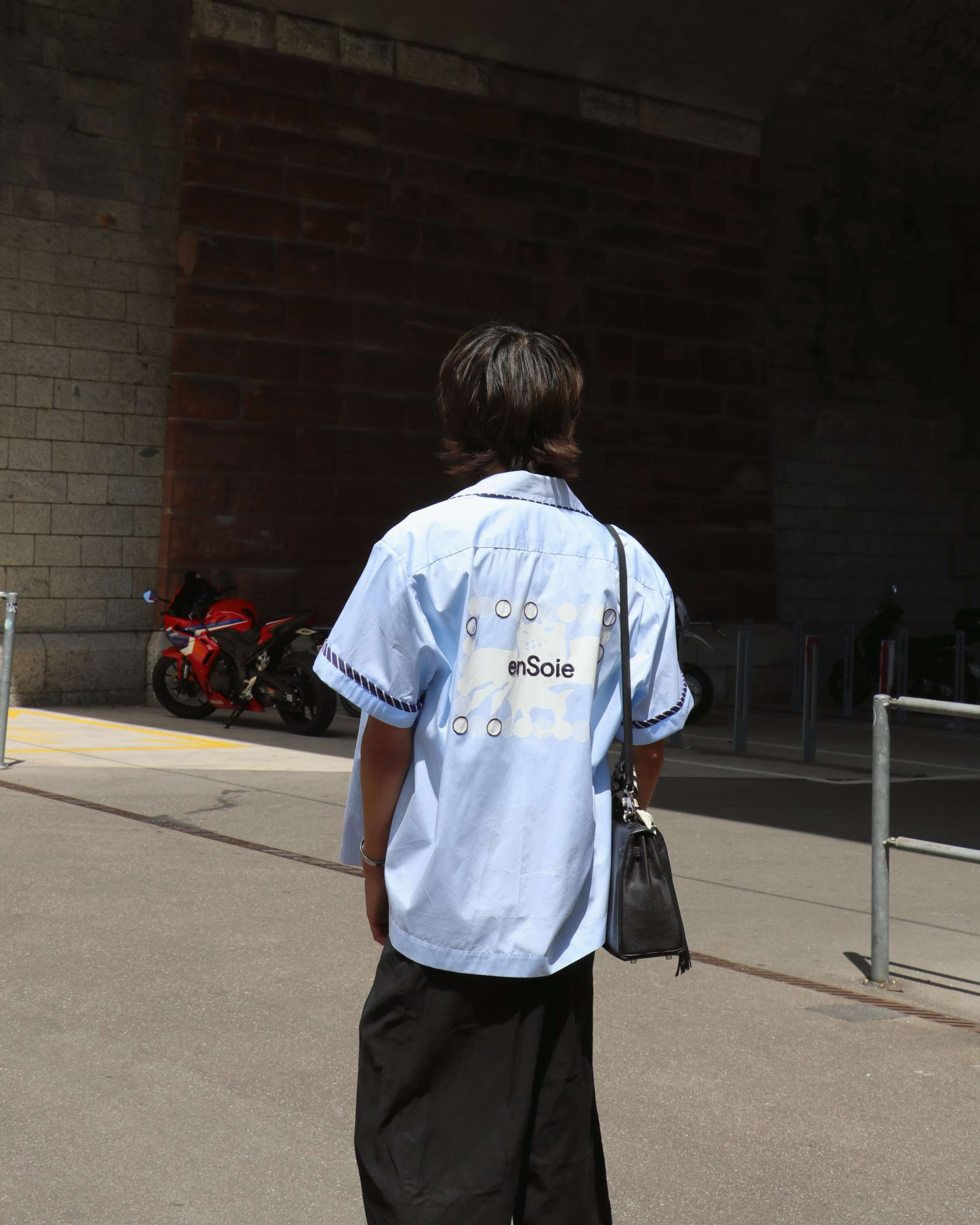 Picture of a young man wearing an enSoie shirt.