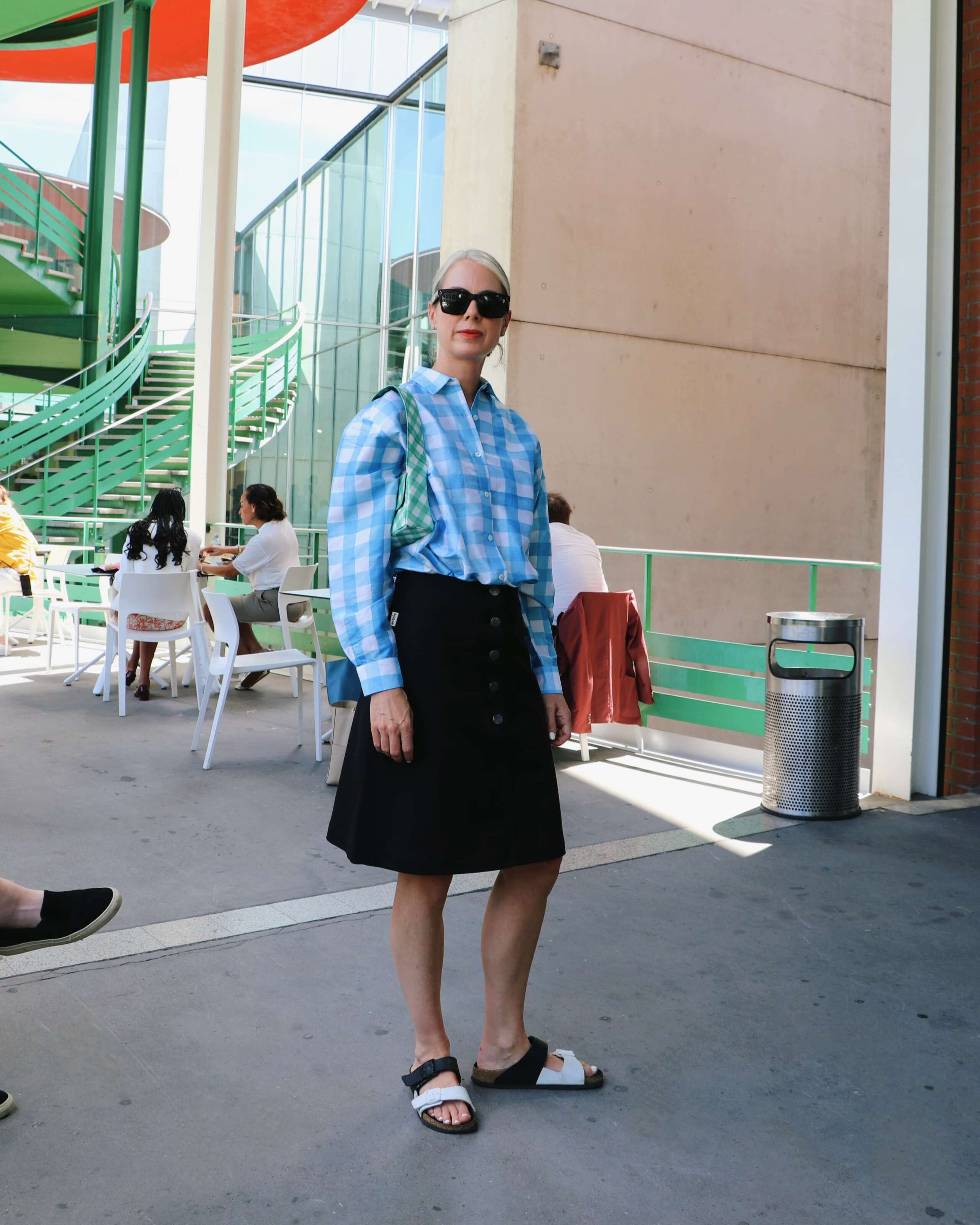 Picture of a women wearing a Vichy check enSoie blouse