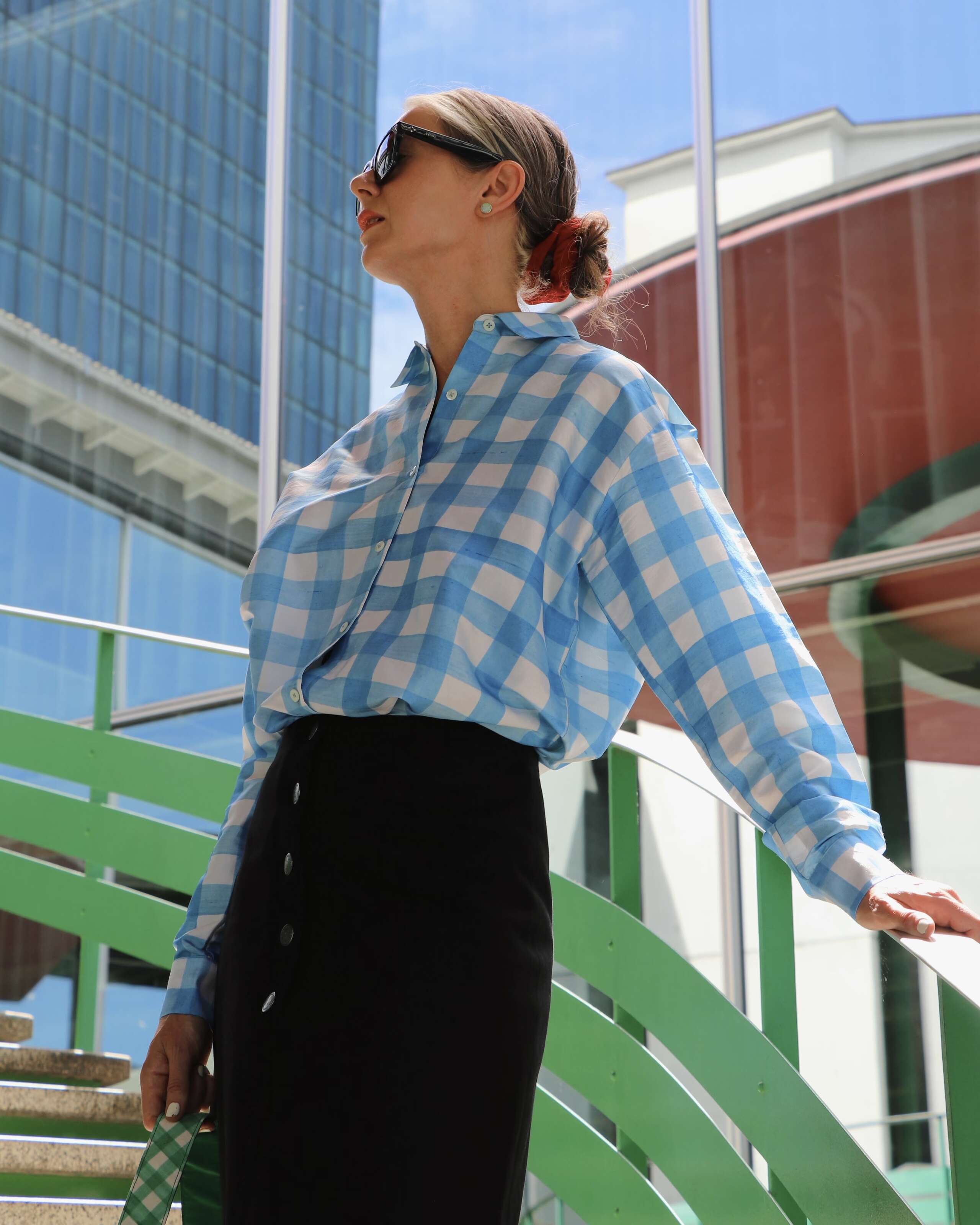 Picture of a women wearing a Vichy check enSoie blouse