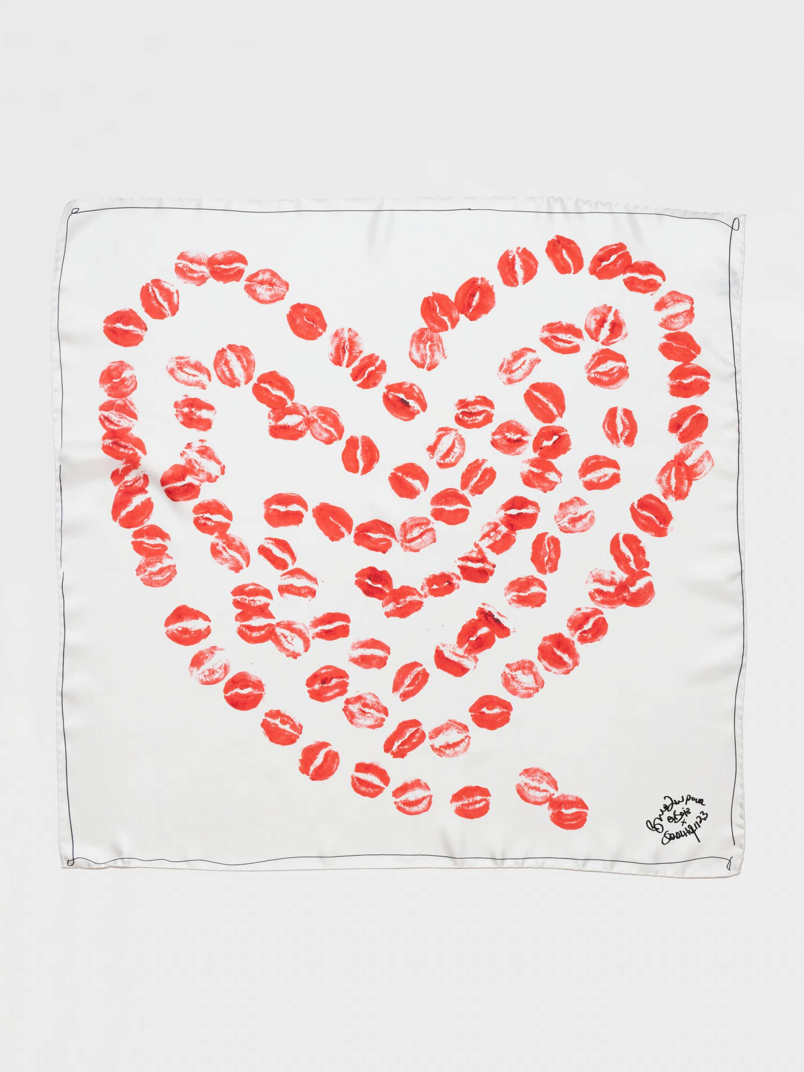 Picture of a silk foulard with kiss print designed by Bruno Zhu for enSoie