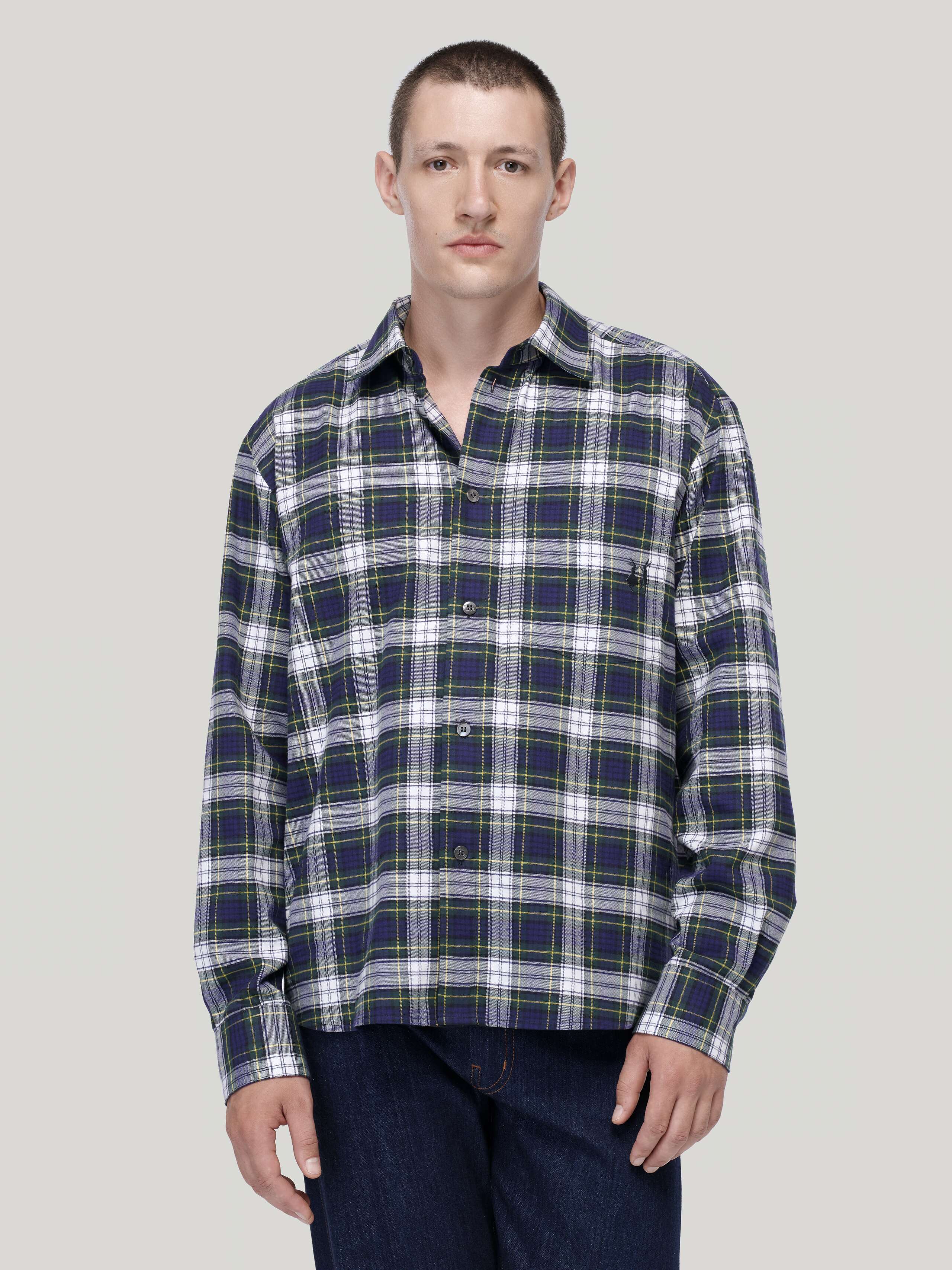 Otto flannel shirt in Woodpecker Check worn by male model