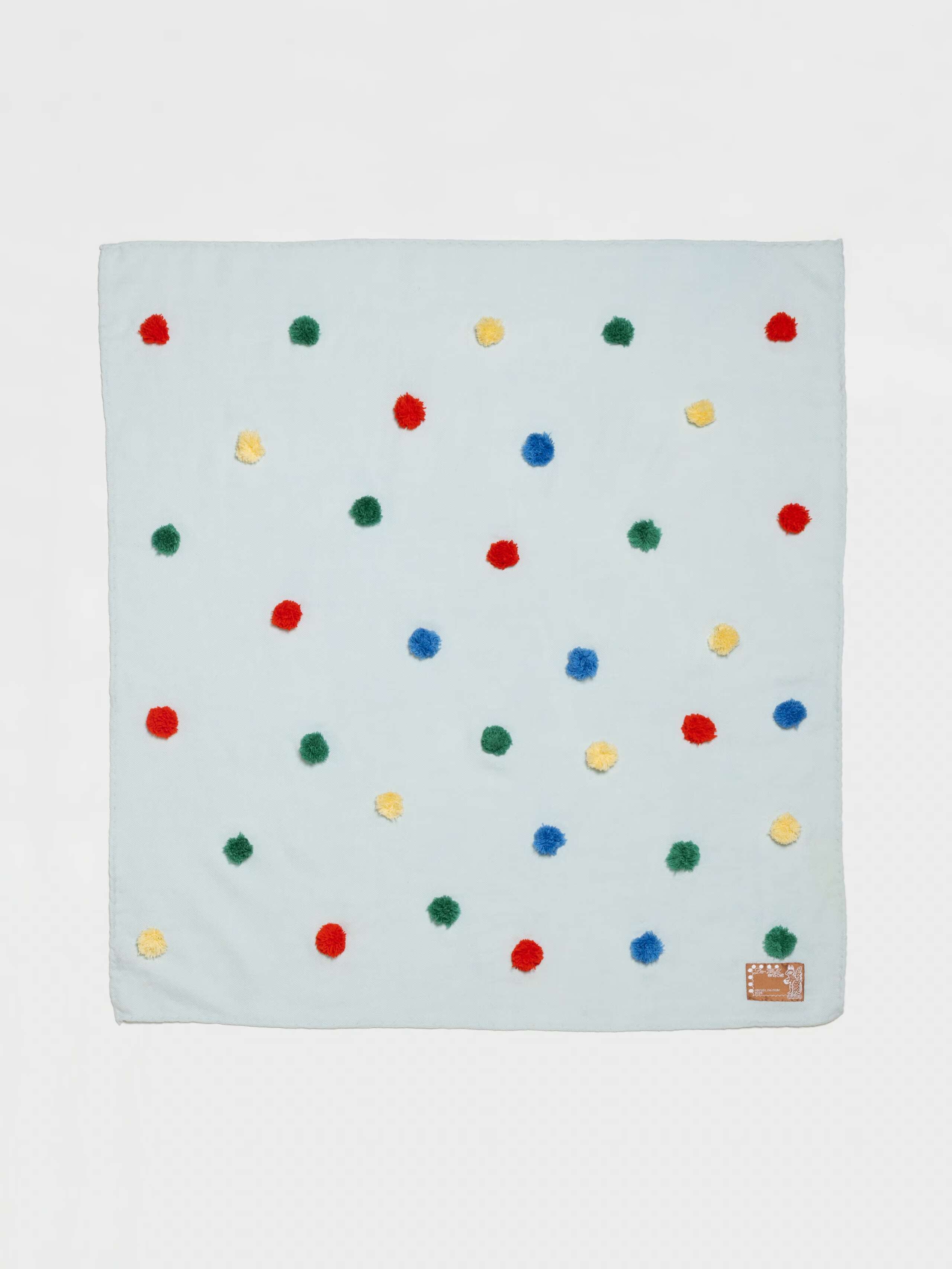 Pompon embroidered wool foulard in lighht blue with multicoloured pompons