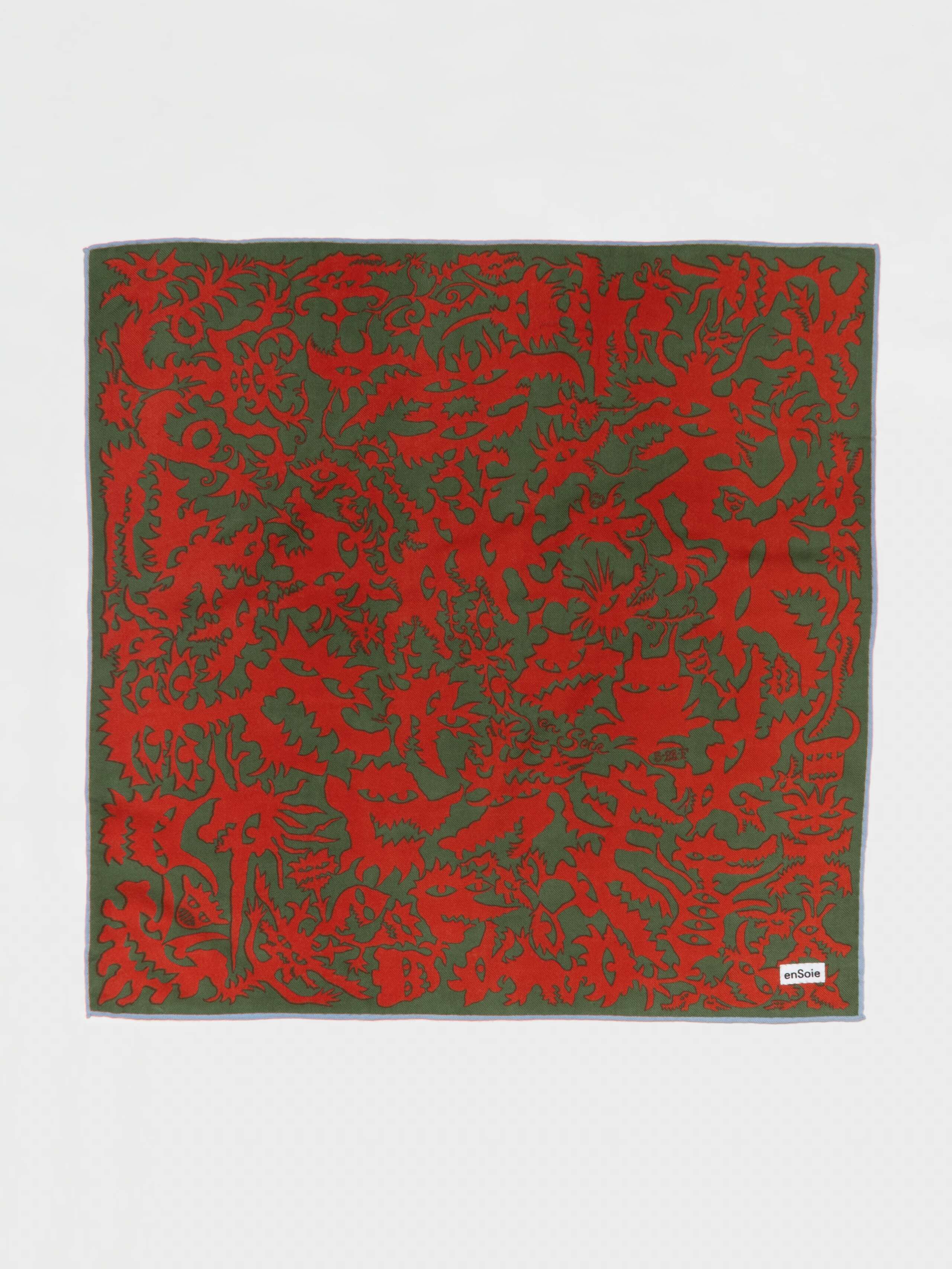 Monster print wool foulard in green/red with light blue border