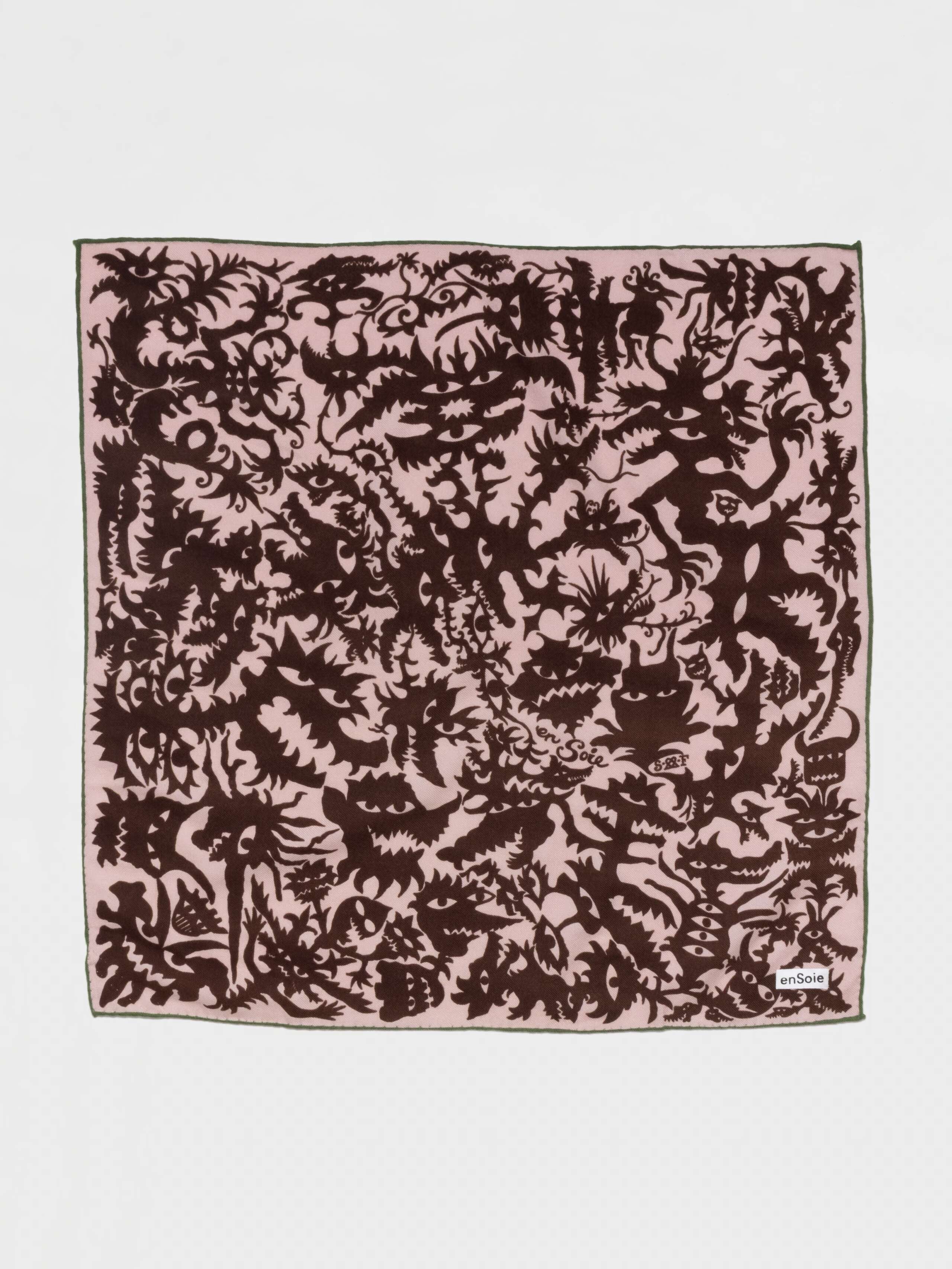 Monster print wool foulard in light pink/brown with green border