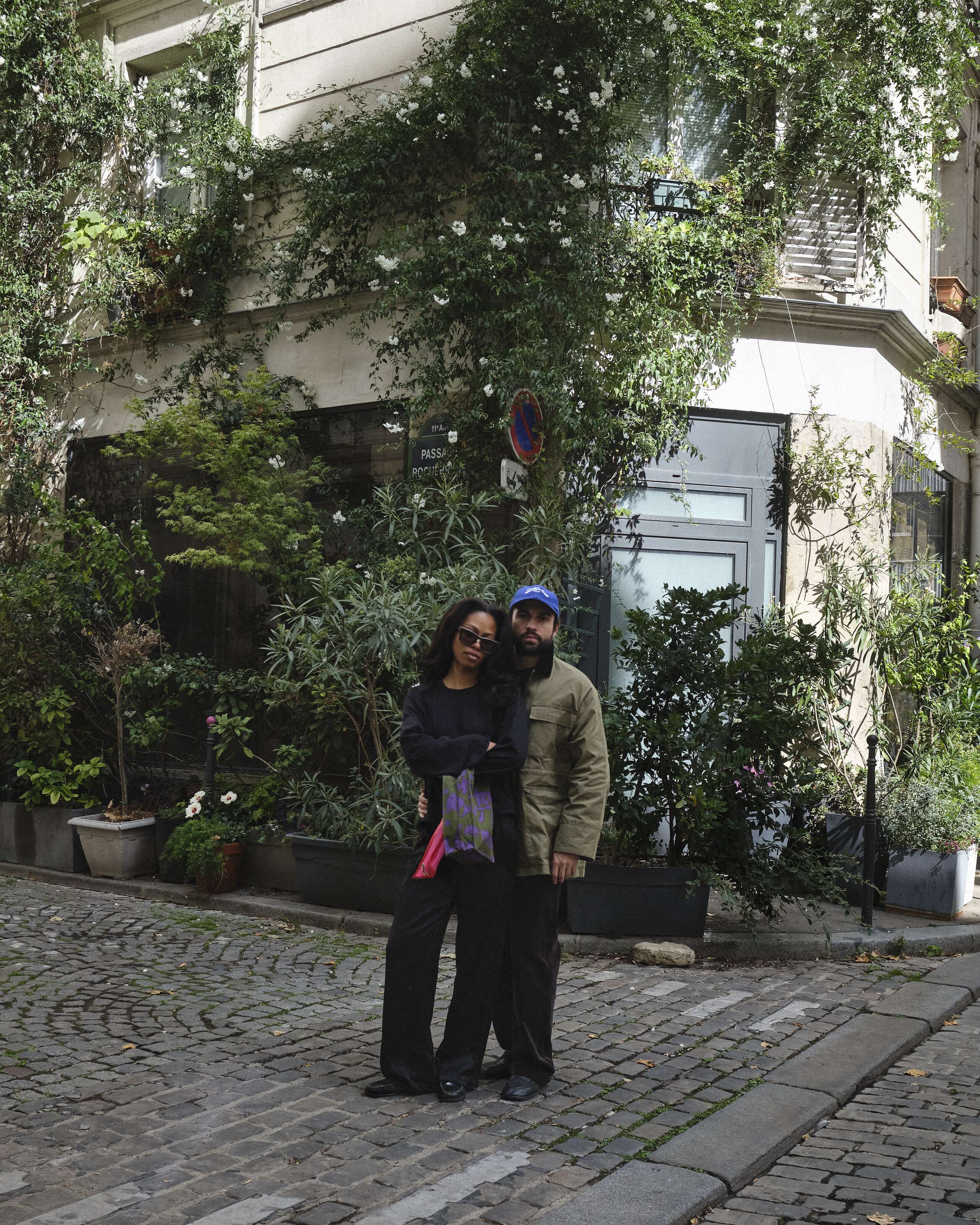 Picture of a couple walking through the streets of Paris.
